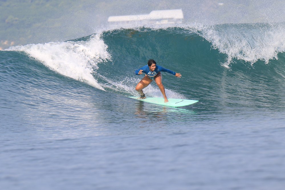 Do I need to know swimming before taking surfing lessons?