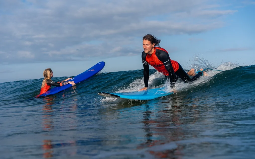 What should I carry to a surf lesson?